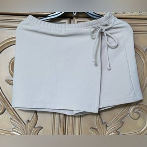 Skort by MK Knits in off white color very stretchy material guc size small
